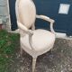 Antique armchair in Louis XVI style from the late 19th century.