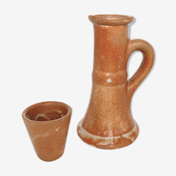 Candlestick and sandstone vase