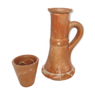 Candlestick and sandstone vase