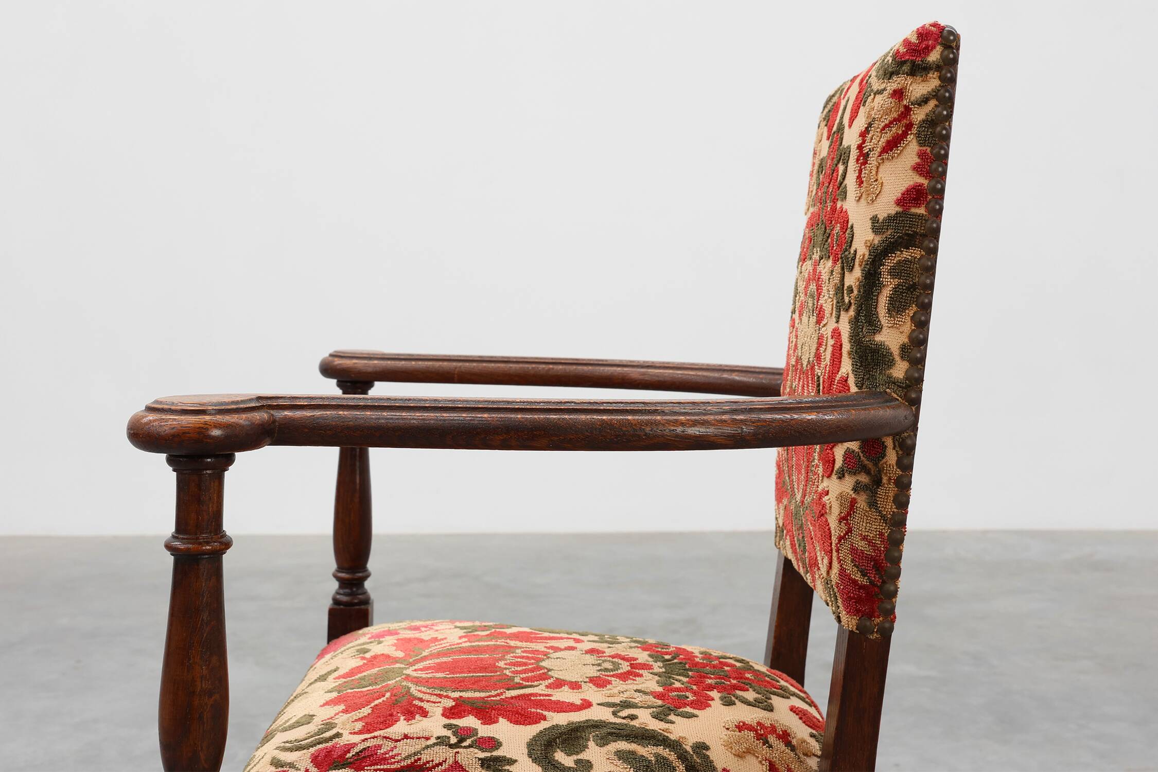 Antique oak Louis XIII style chair with floral upholstery, France ca. 1890
