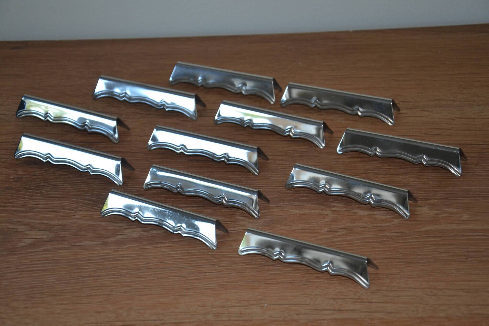 12 silver-plated knife rests