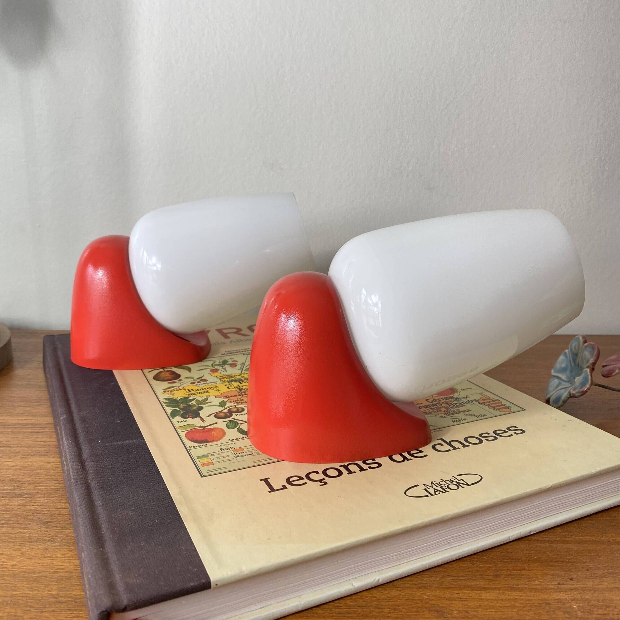 Pair of vintage wall lights in plastic and white opaline glass.