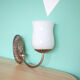 Metal wall lamp and serrated glass globe
