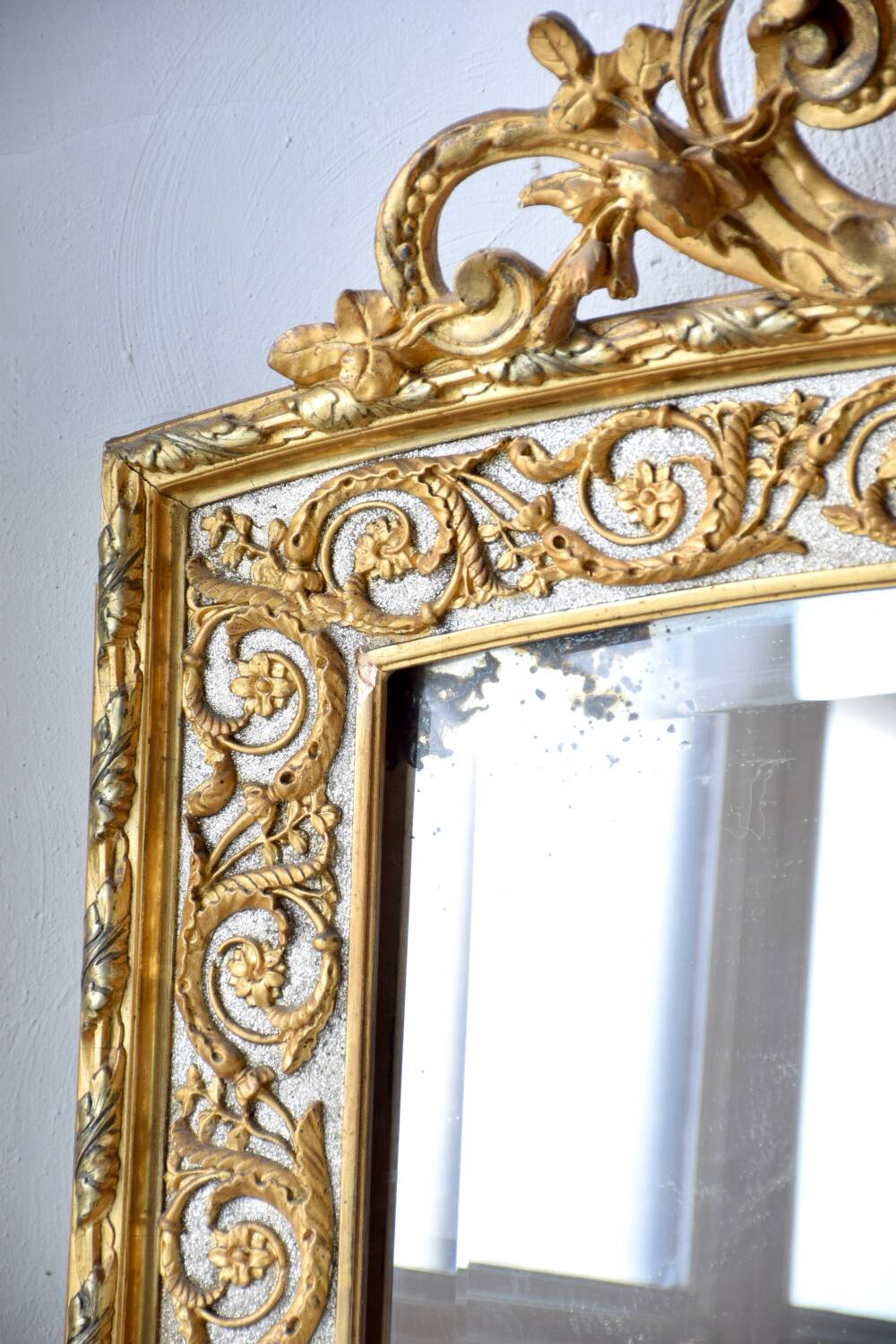 Large antique gilded mirror in the Baroque style