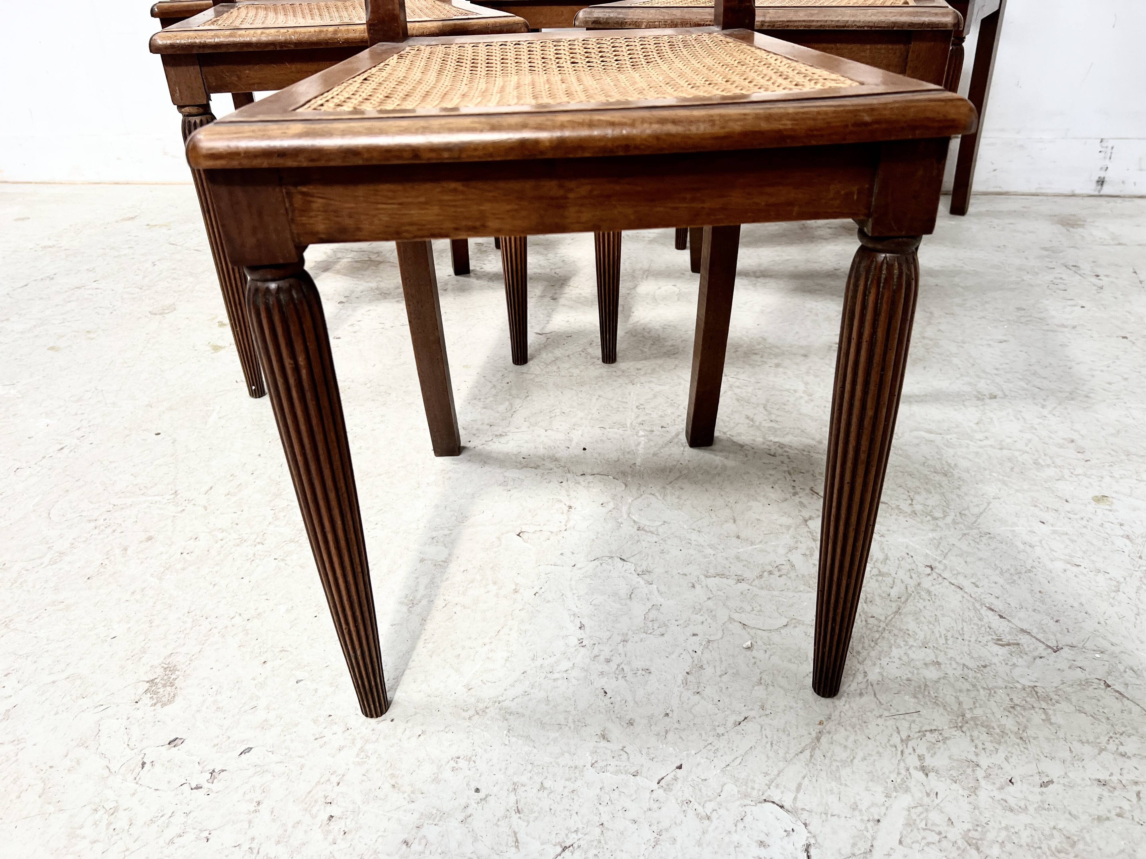 Set of six Art Deco chairs in solid walnut, 20th century.