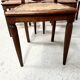Set of six Art Deco chairs in solid walnut, 20th century.