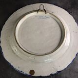 Antique glazed ceramic wall plate with battle scene decoration 41.5 cm