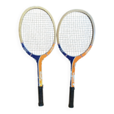 Pair of vintage wooden tennis rackets for cadet junior sport courier
