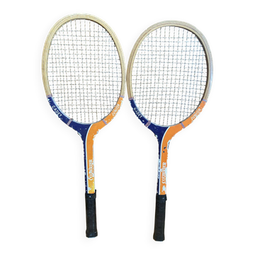 Pair of vintage wooden tennis rackets for cadet junior sport courier