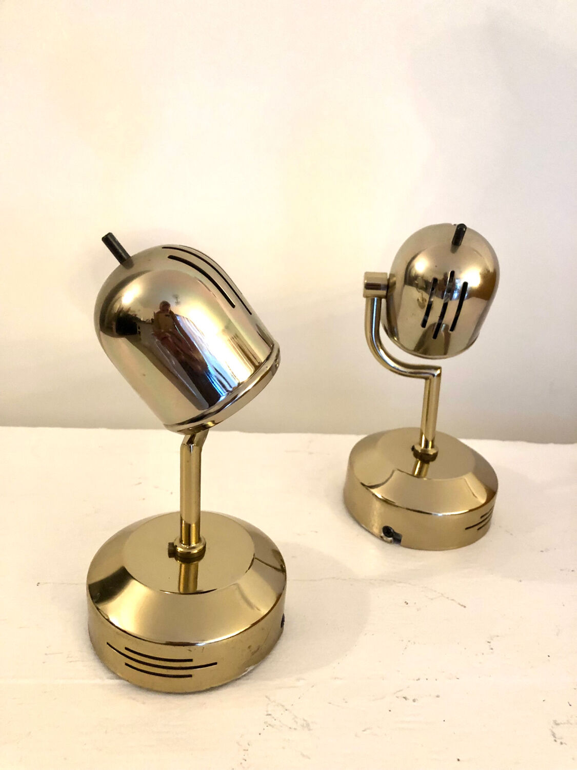 Vintage Fase adjustable wall lights in gold metal.
