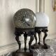 Pair of marble spheres on bronze tripods, 19th century