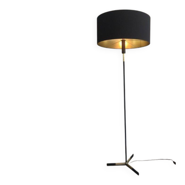 Designer floor lamp in black lacquered metal and brass