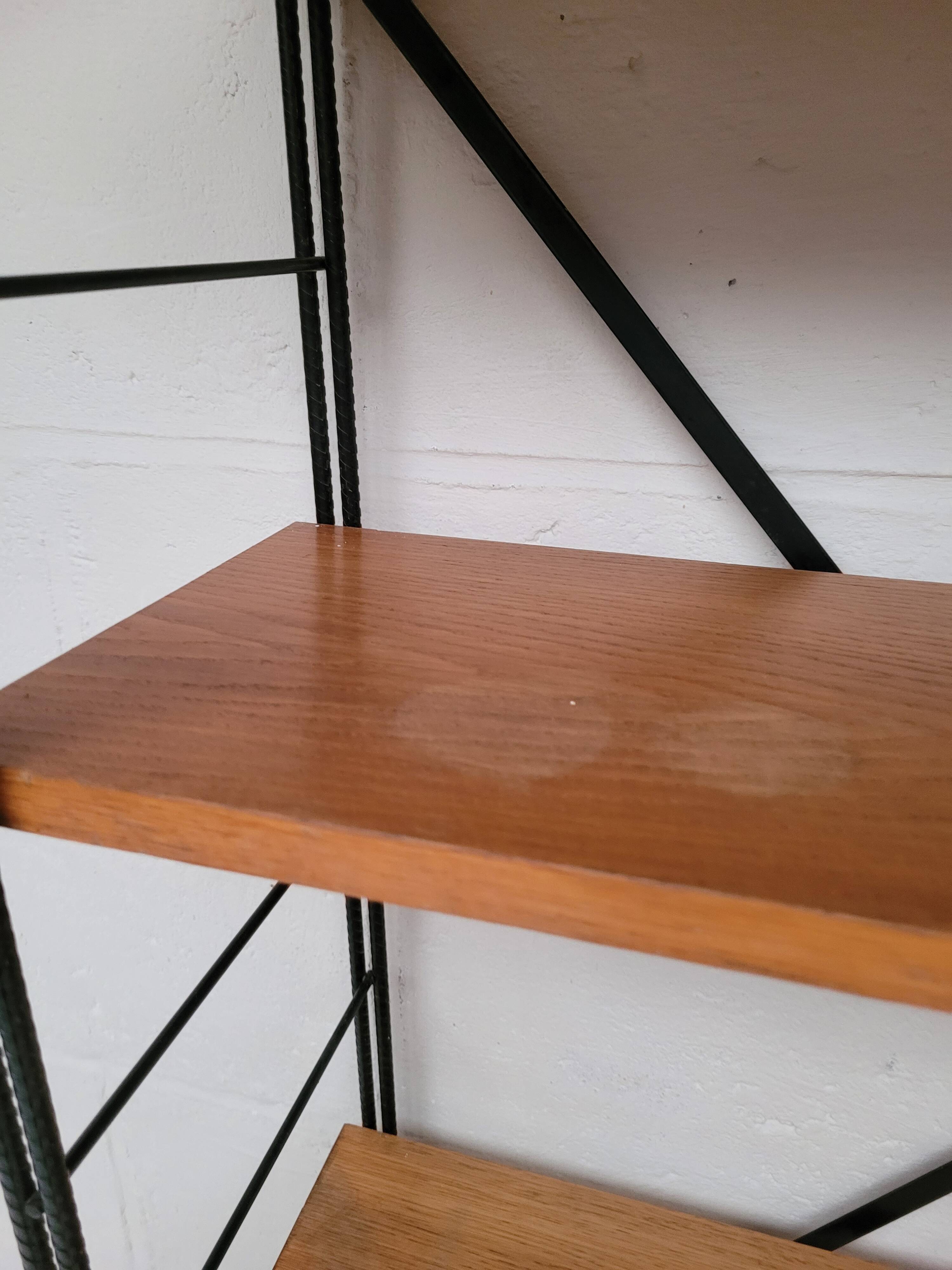 String bookcase on legs from the 50s