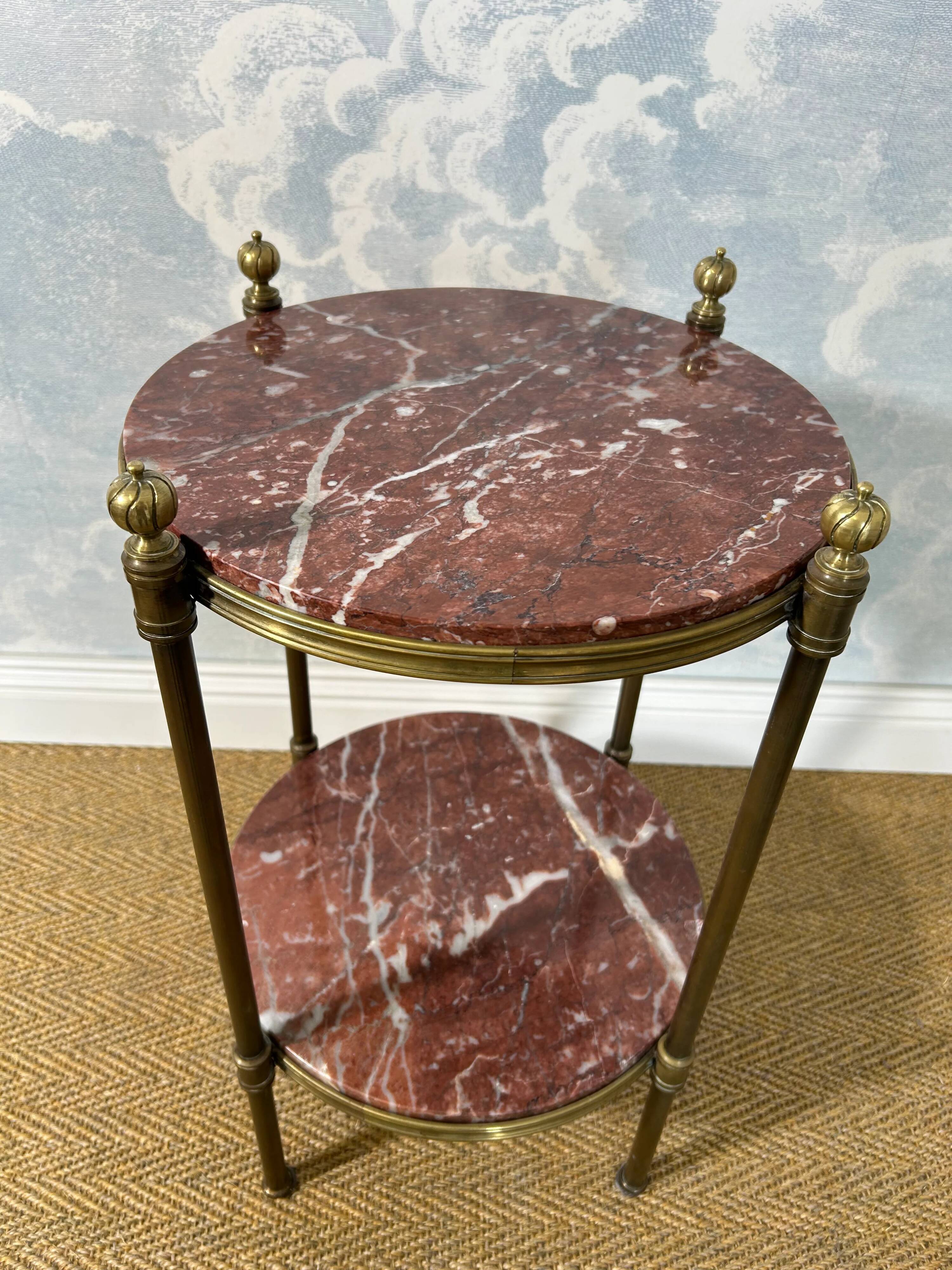 Two-tiered gueridon in Emperador marble on a brass structure, 1970s.