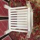 Wooden bedside table painted white