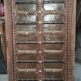 Old wooden door with frame