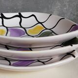 Three vintage free-form ceramic ravine dishes from the 1950s