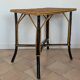 Table en bois et rotin 1920