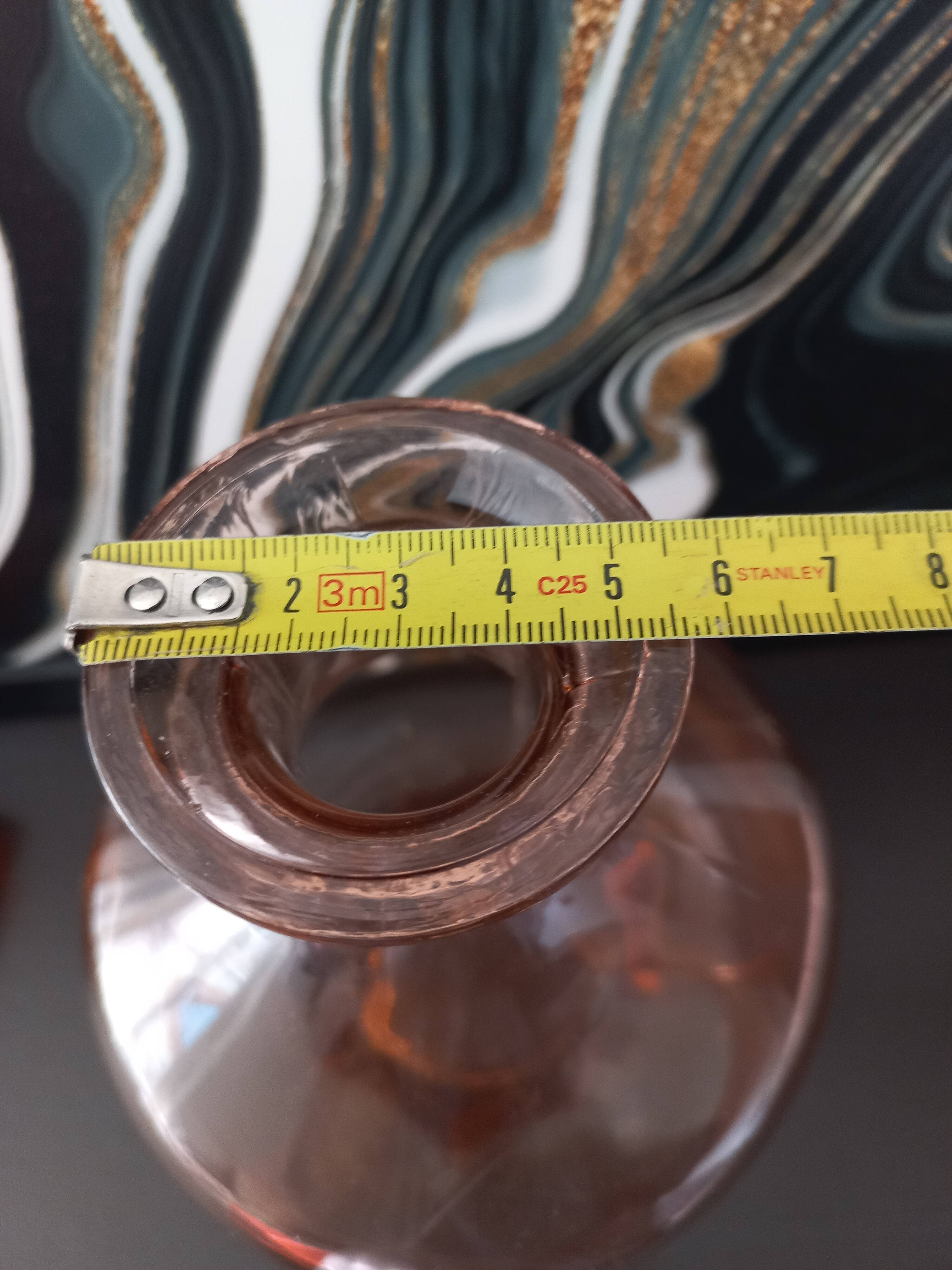 Vintage glass carafe in pink-orange, retro-chic style.