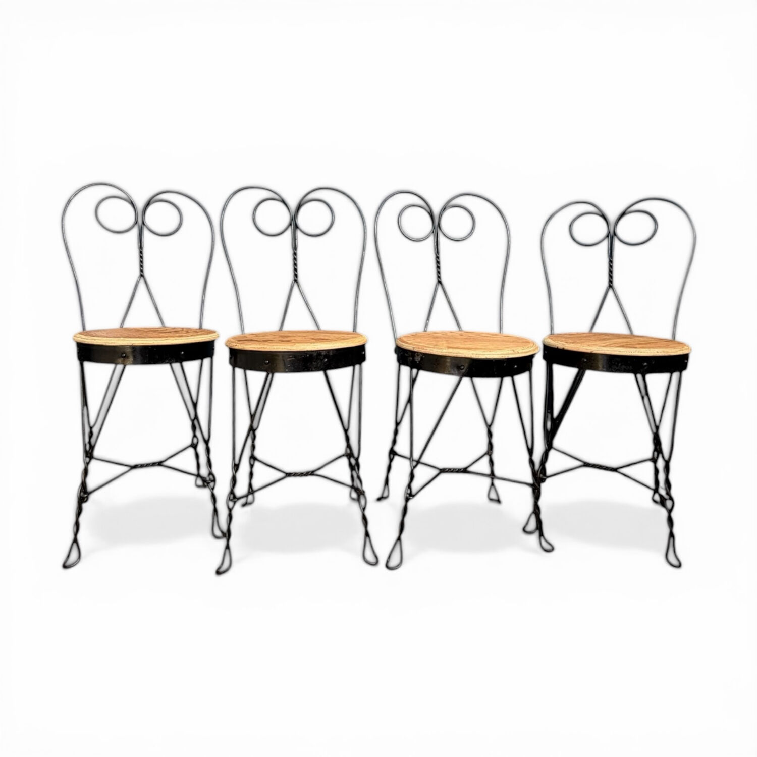 Set of 4 vintage wrought iron chairs from the 1940s.