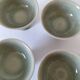 Set of 4 handmade ceramic bowls – celadon glaze & raku style