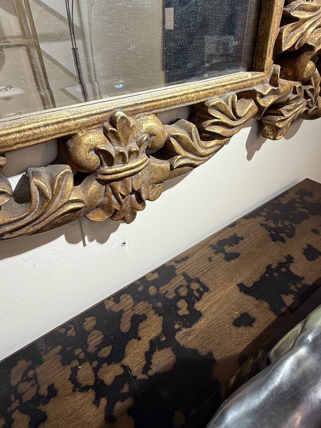 Gold wooden wall mirror with floral decoration