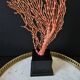 Large Red/Orange Gorgon Black wooden base. H: 36 cm