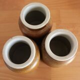 A set of 3 vintage glazed stoneware vases for indoor use.