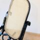 Rocking-chair vintage en bois courbé et cannage 1960