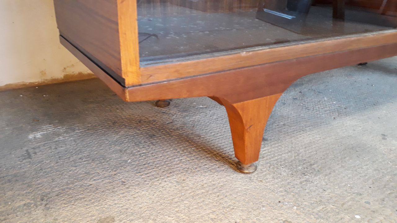 Old teak and glass showcase