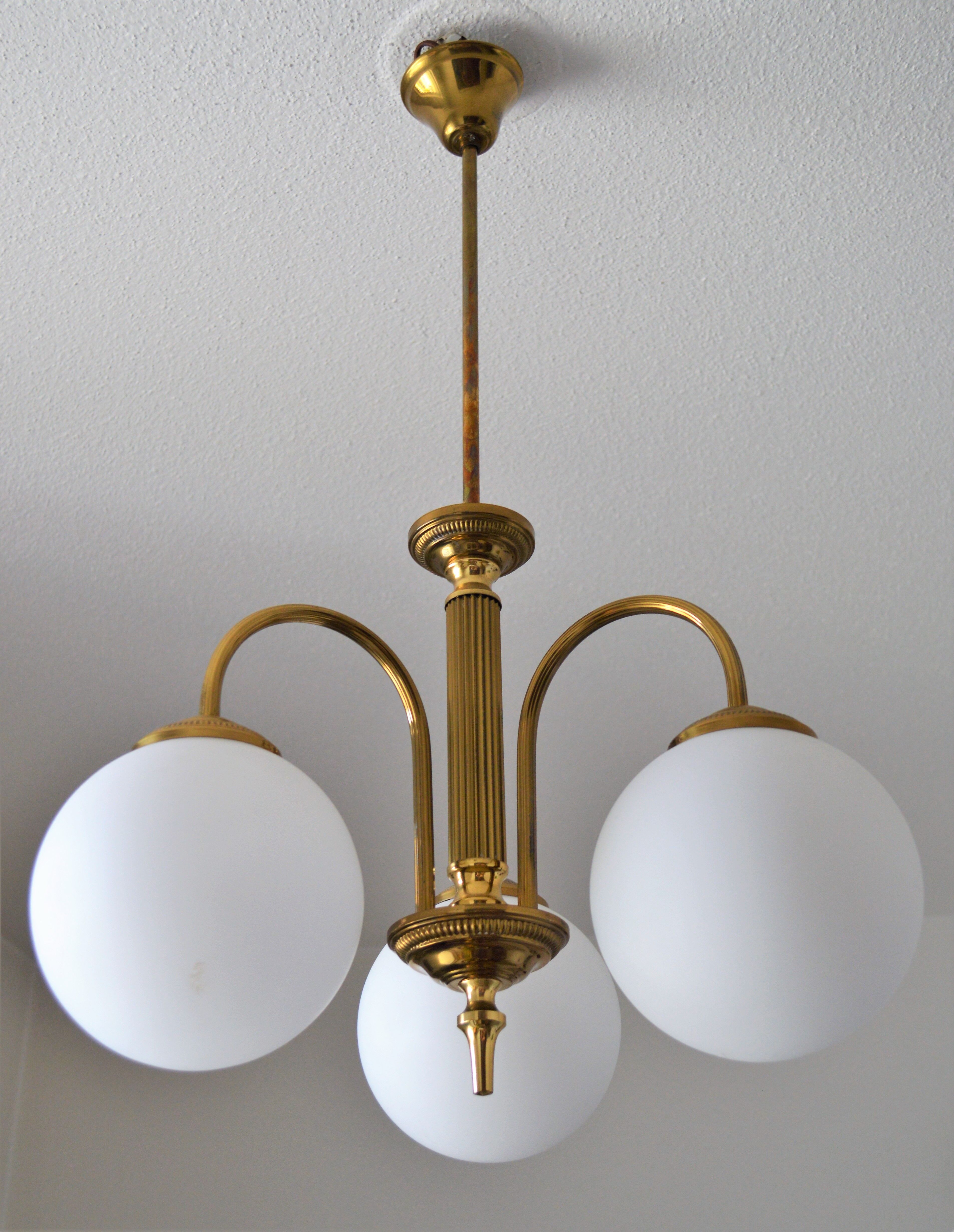 Vintage chandelier of the 60s in brass