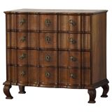 Antique baroque oak commode from the late 18th century with cabriole legs.