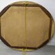 Golden oval mirror