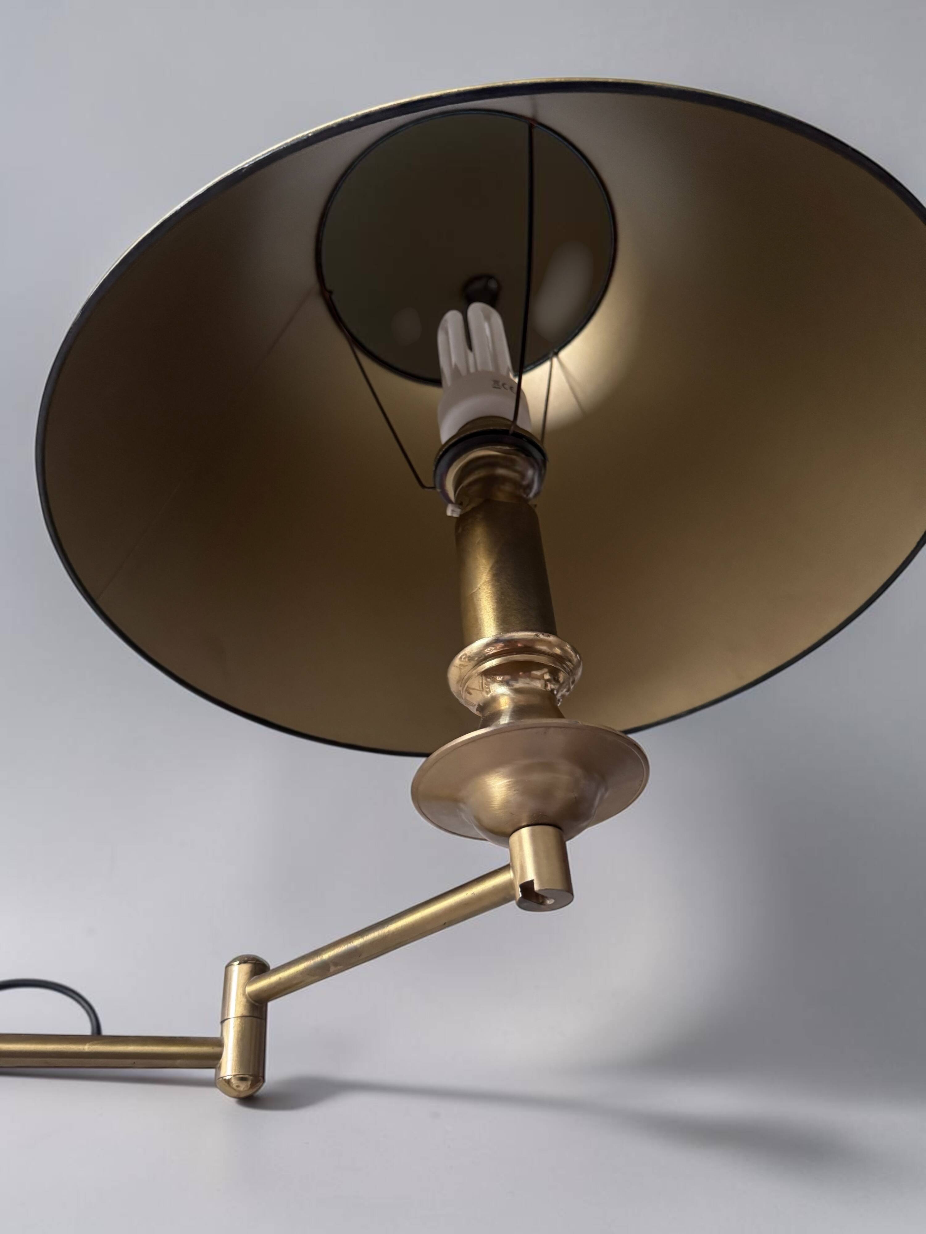 Brass reading floor lamp, adjustable arm, vintage anthracite shade.