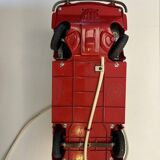 Red Renault estafette guided by a wire