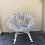 Vintage white rattan armchair