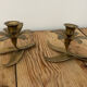 Pair of brass flower candlesticks
