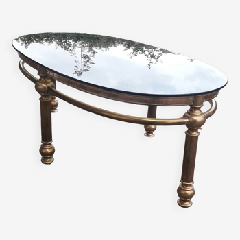 Oval coffee table in gilded brass and smoked glass 1970