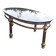 Oval coffee table in gilded brass and smoked glass 1970