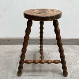 Wooden tripod farm stool