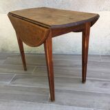 Round table at 2 vintage wood rabats