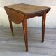 Table ronde à 2 rabats en bois vintage