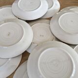 Série de 11 assiettes plates, faïence hollandaise, début XX