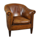 Club chair in patinated sheepskin