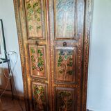 2-door wardrobe with painted patterns on wood