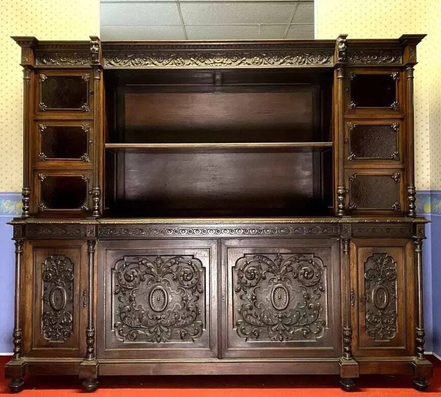 Renaissance-style sideboard, entirely made of walnut and richly carved.