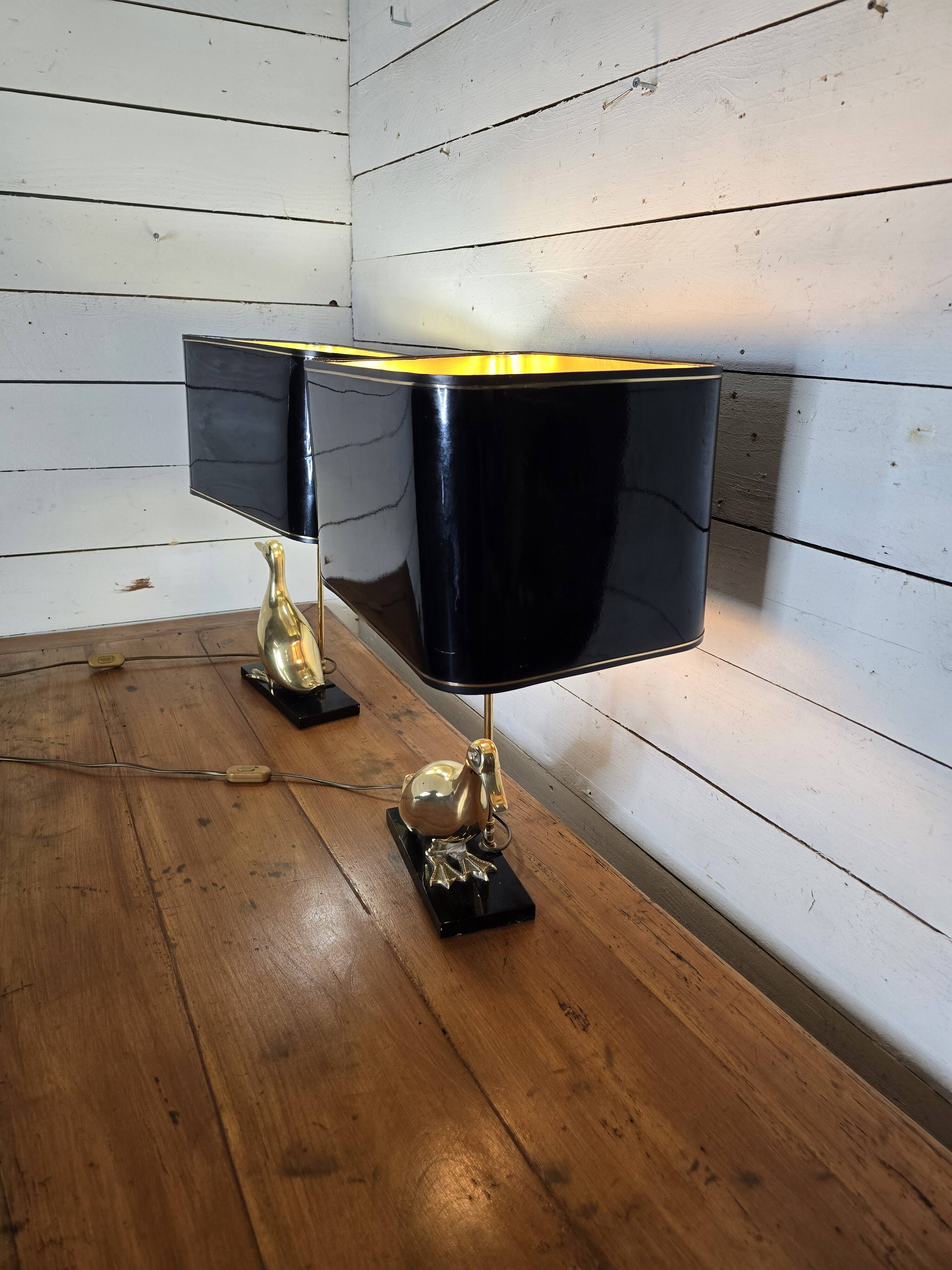 Pair of 70s table lamps featuring a brass duck