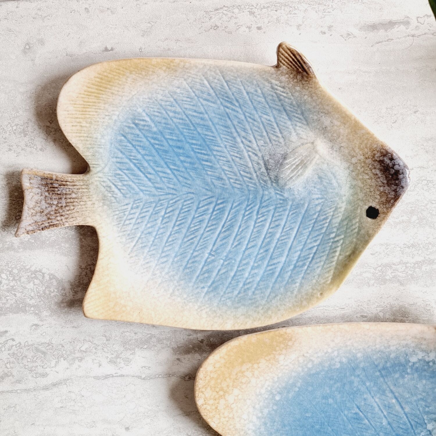 2 empty ceramic fish pockets