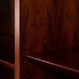 Rosewood library designed by Danish designers with doors by Hundevad & Co, 1960s.