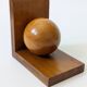 Pair of vintage bookends with polished wooden balls, Art Deco style